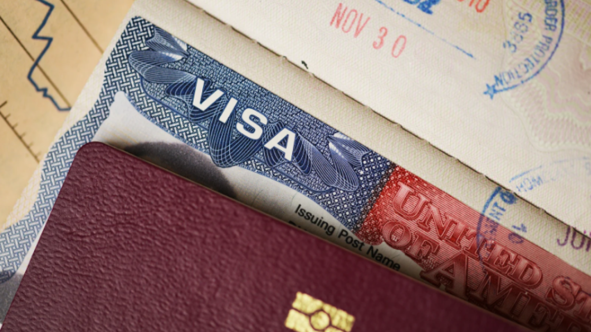 The picture displays a closeup picture of a visa.