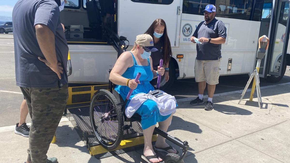 Veteran in wheelchair getting out of VA van