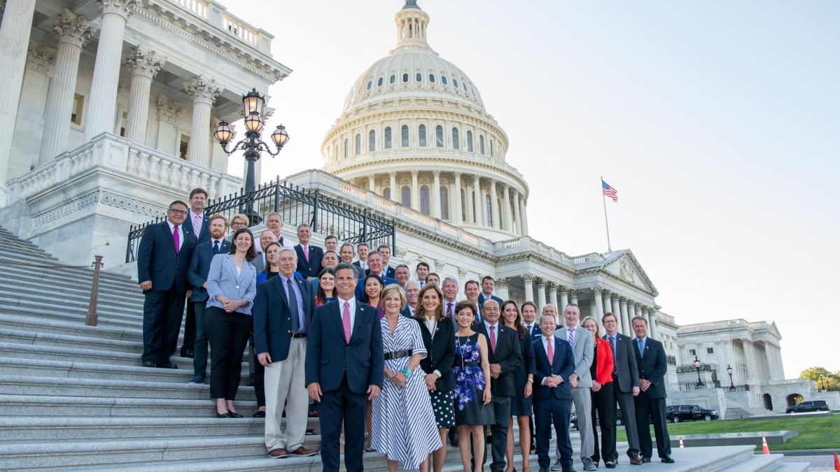 Problem Solvers Caucus Members in front of the US Capitol