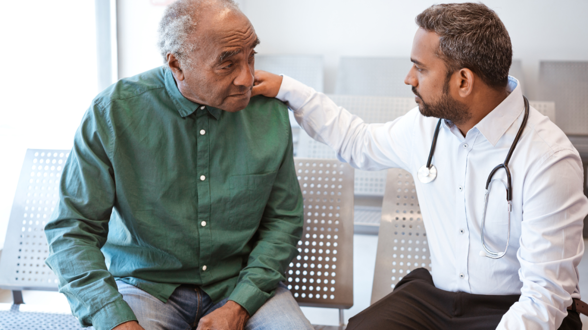 Doctor treating man